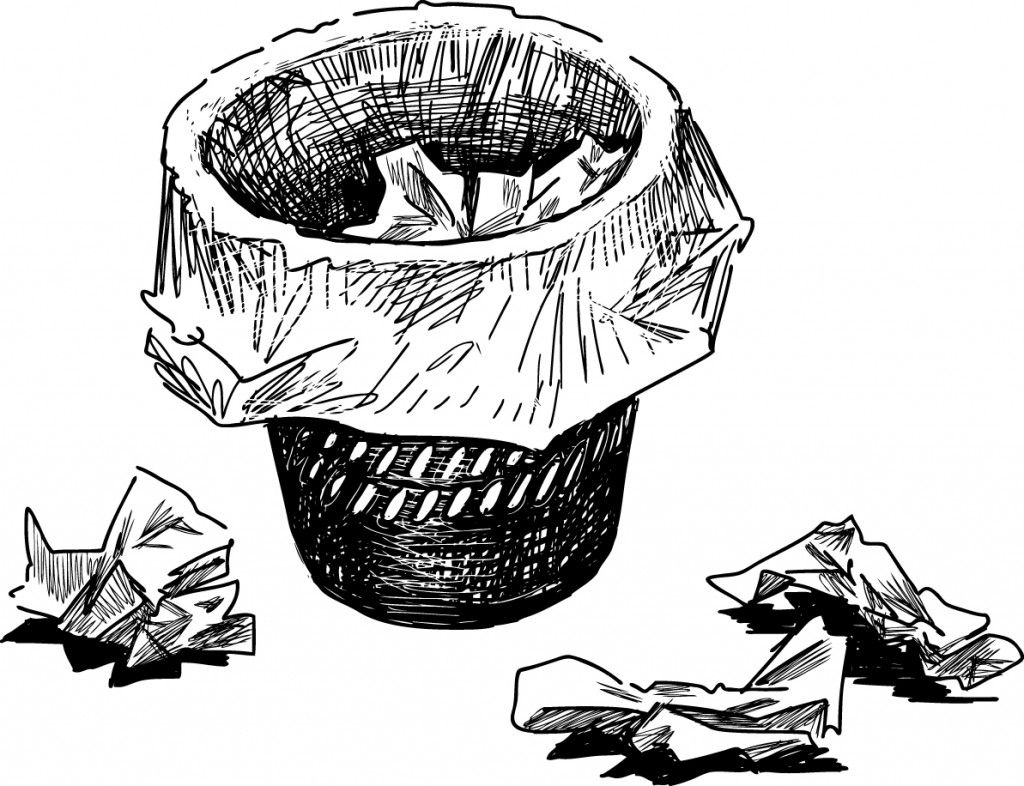 Flyers discarded in a wastepaper basket